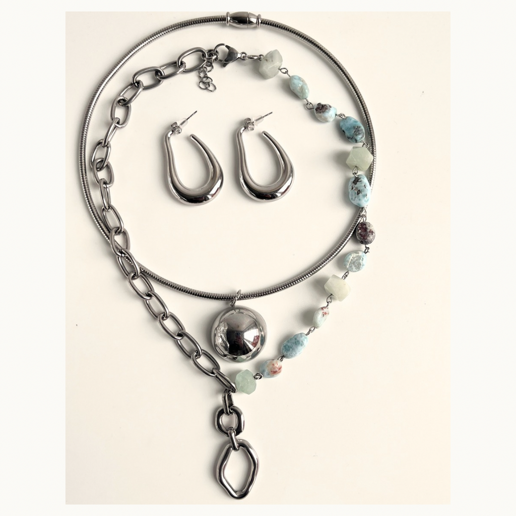 Collier “Nova” – Éclat Cosmique en Acier Inoxydable Argenté