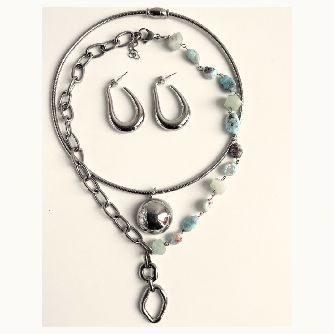 Collier “Nova” – Éclat Cosmique en Acier Inoxydable Argenté