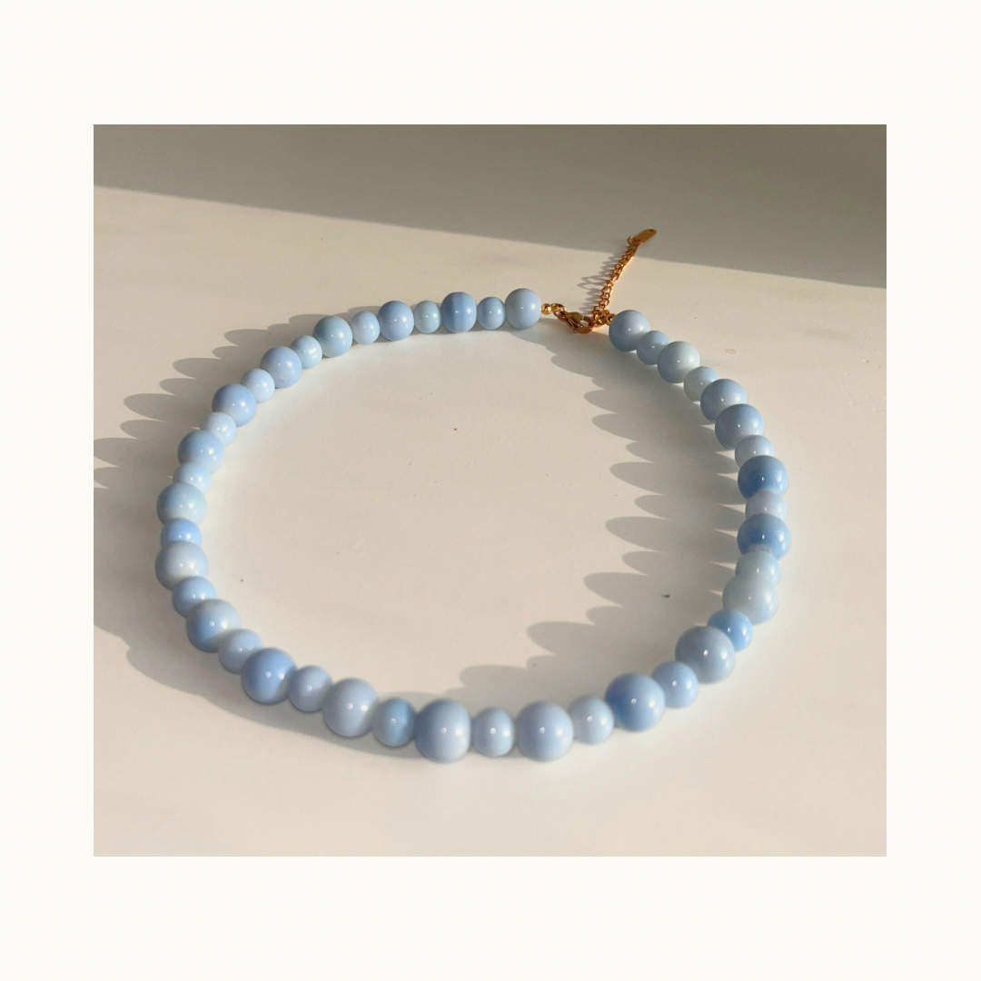 Collier “Blue Flow” – Perles bleu ciel — Acier inoxydable