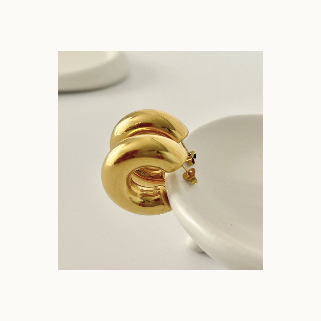 Boucles d’Oreilles acier inoxydable Bold Curve – Le Statement Bijou Qui Change Tout